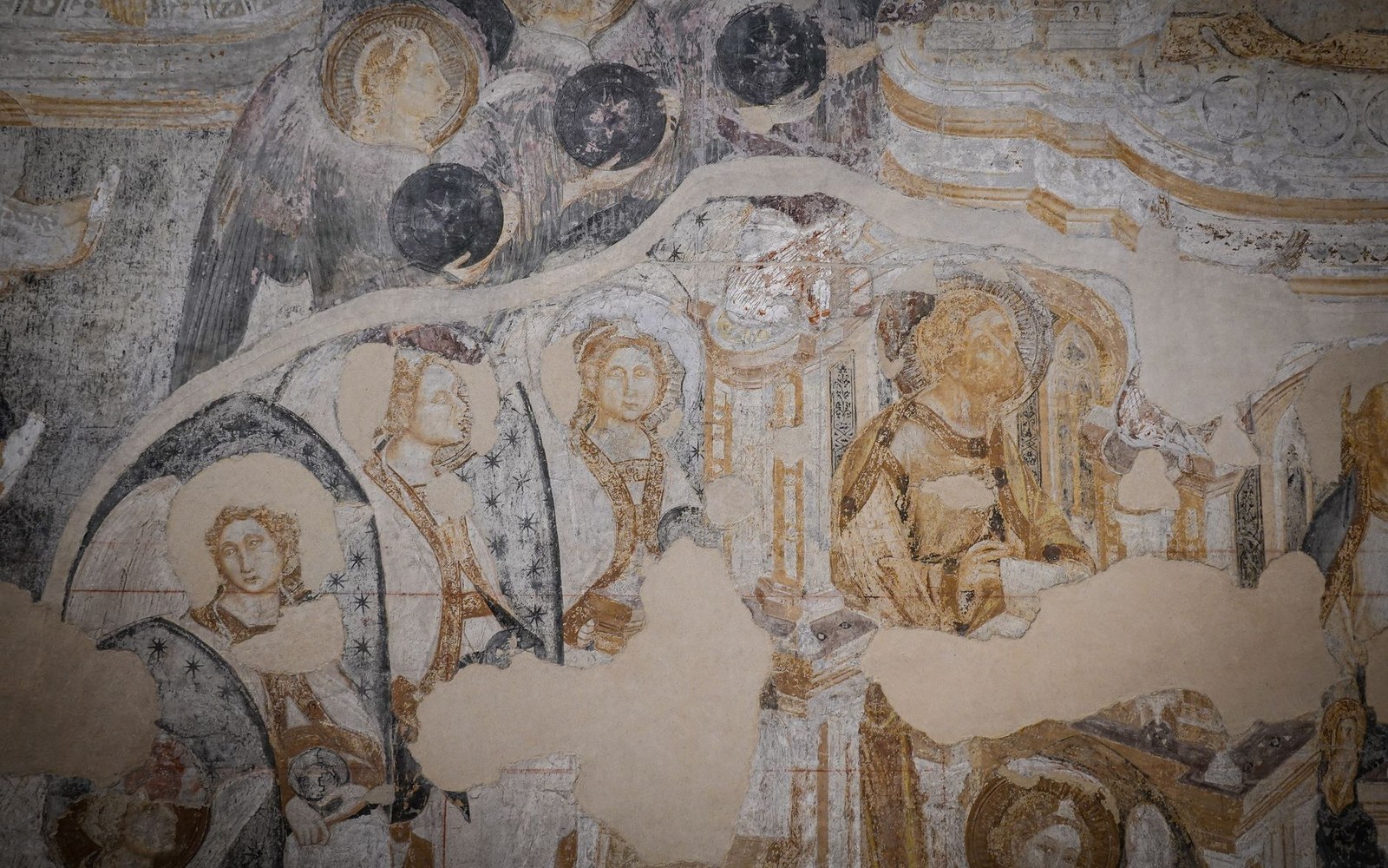 A fresco surface in raking light showing the plaster joins