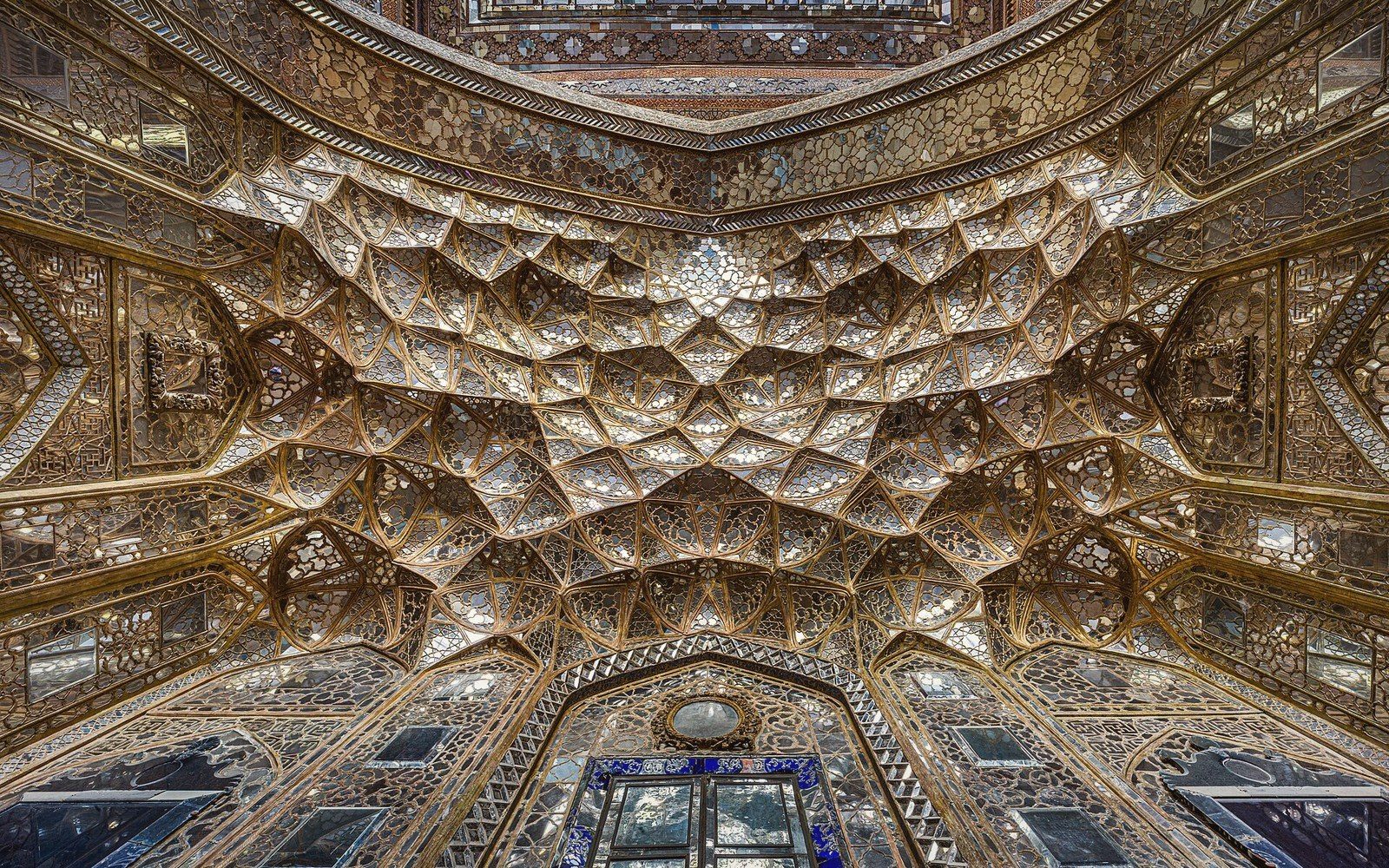 A muqarnas ceiling shot straight up